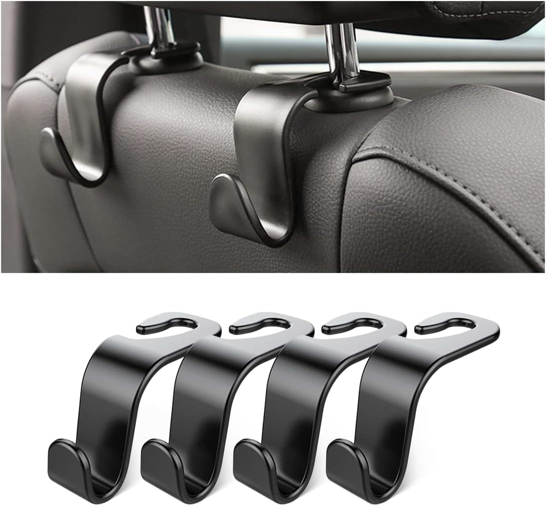 Headrest hooks holding grocery bags in car