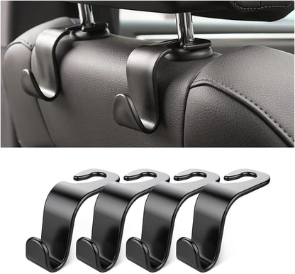 Headrest hooks holding grocery bags in car