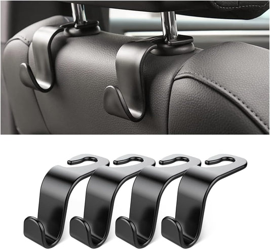 Headrest hooks holding grocery bags in car