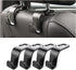 Headrest hooks holding grocery bags in car