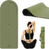 Olive green arch-shaped yoga mat with centre markings, shown rolled and flat beside a woman using the matching stretch strap.
