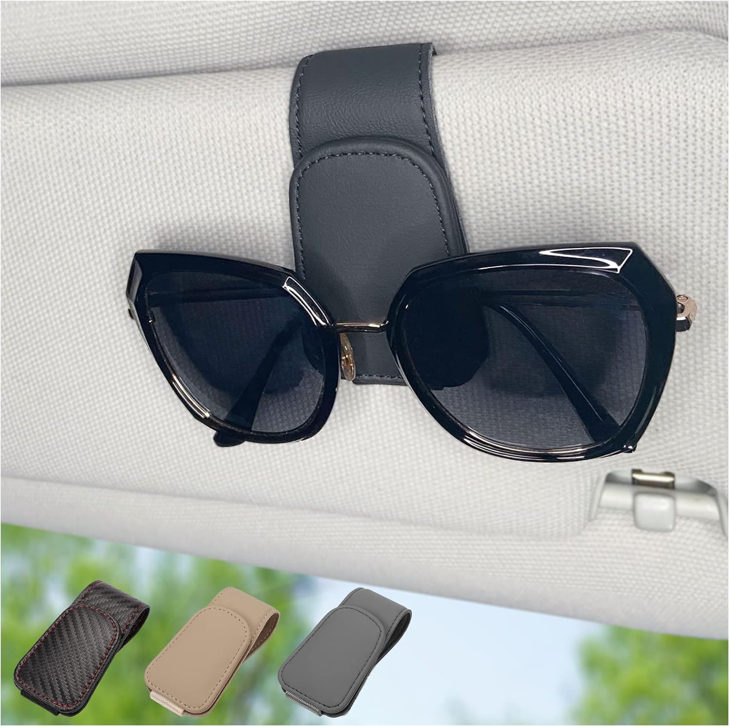 Sunglasses clipped in magnetic car visor holder