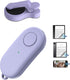 Purple Page Turner clipped to an e reader while a reader turns pages quietly hands free during bedtime reading.