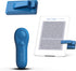 Page Turner remote clipped to an e reader while a traveler reads hands free under a warm blanket.