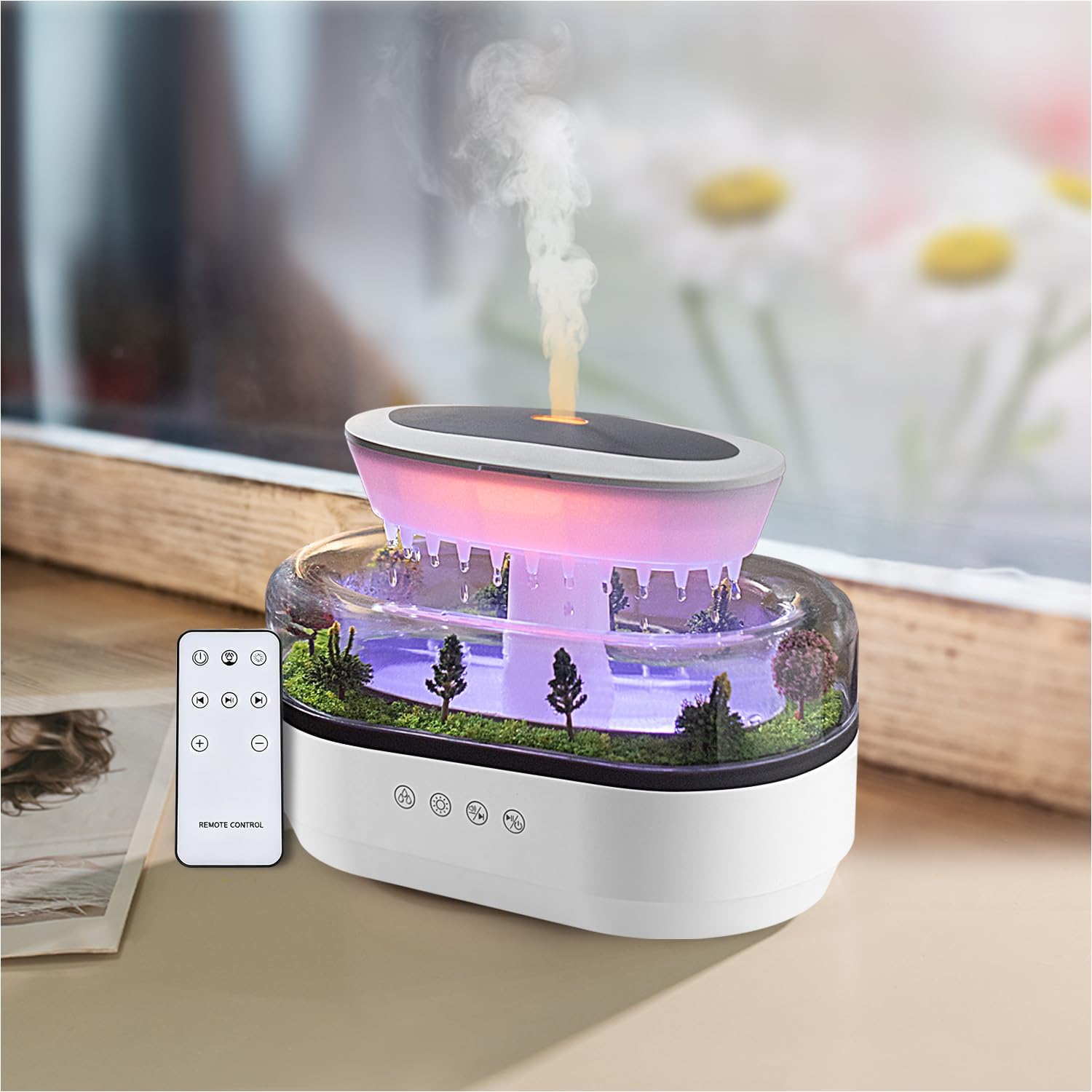 Essential oil diffuser with rain sound and mist function