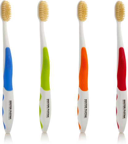 Four soft bristle flossing toothbrushes with white handles, cream-colored bristles, and blue, green, orange, and red grips.