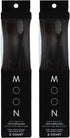 Four black manual toothbrushes with extra-soft tapered bristles in individual black packages.
