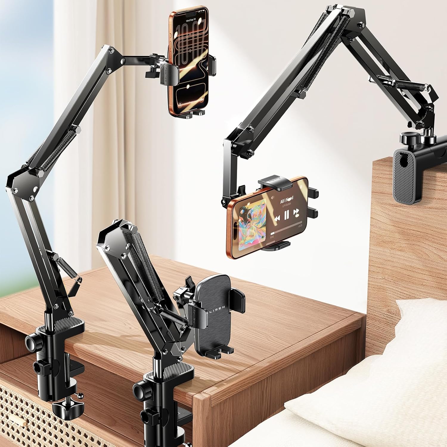 Flexible gooseneck mobile stand clamped to desk for hands-free viewing