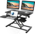 Sit to stand desk converter with spacious work surface