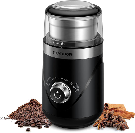 Quiet electric coffee grinder with removable steel cup