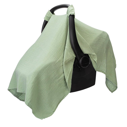 Installed sage canopy providing protection on baby car seat